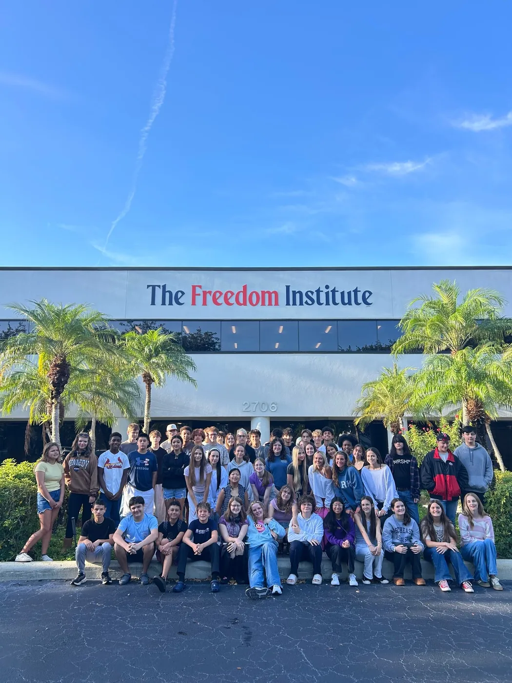 Freedom Naples students in front of the campus